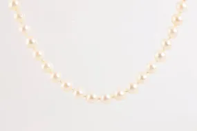 24.5" 14k Yellow Gold 0.07tcw Diamond 0.46tcw Tanzanite Pearl Necklace (49.57g.)