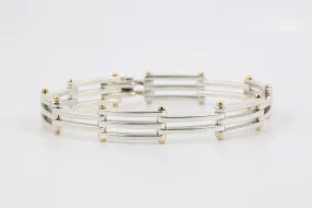 8" Tiffany & Co. 925 Silver & 18k Yellow Gold Gatelink Bracelet (33.56g.)