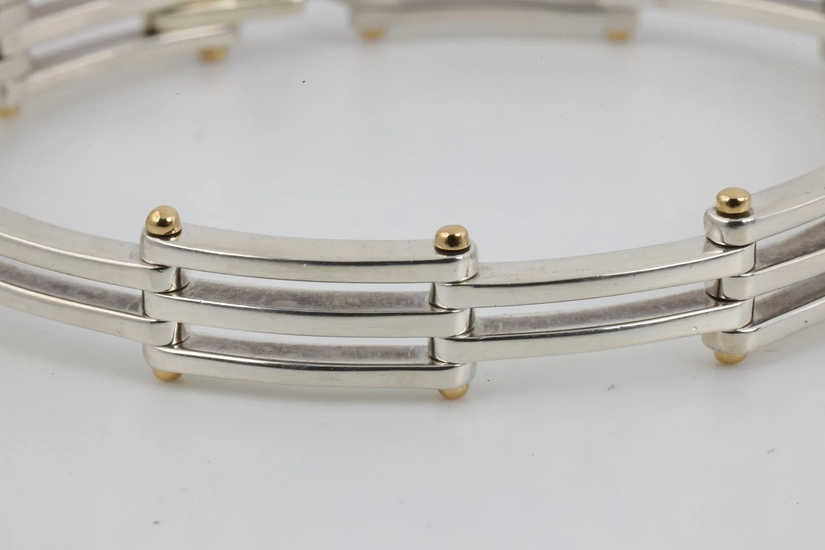 8" Tiffany & Co. 925 Silver & 18k Yellow Gold Gatelink Bracelet (33.56g.)