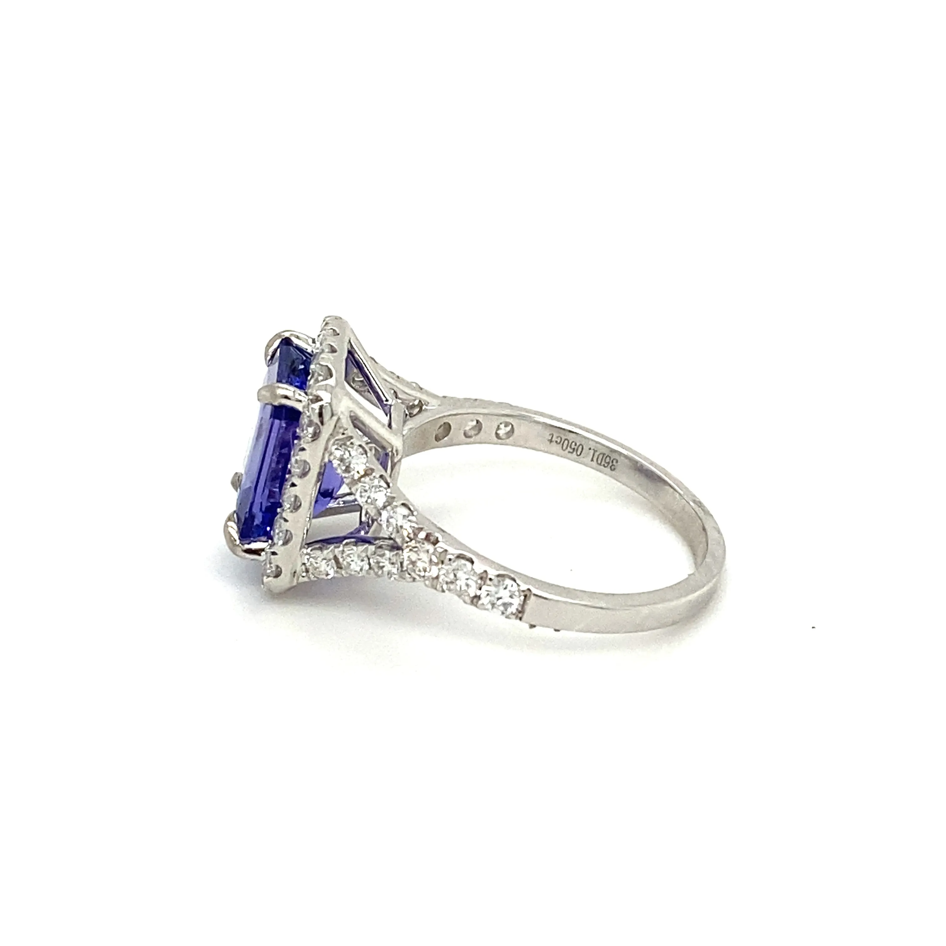 Emerald Cut Tanzanite & Diamond Halo Ring