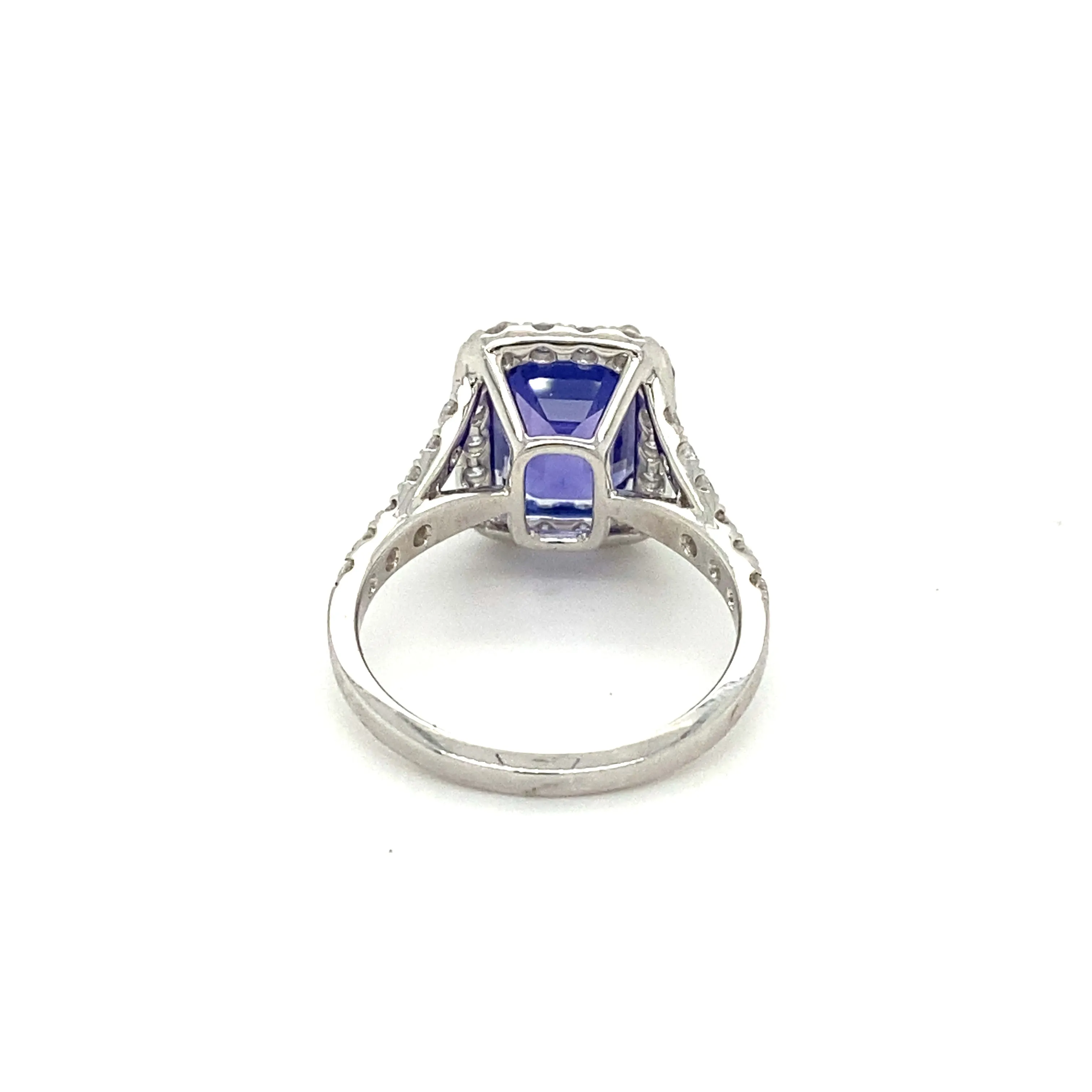 Emerald Cut Tanzanite & Diamond Halo Ring