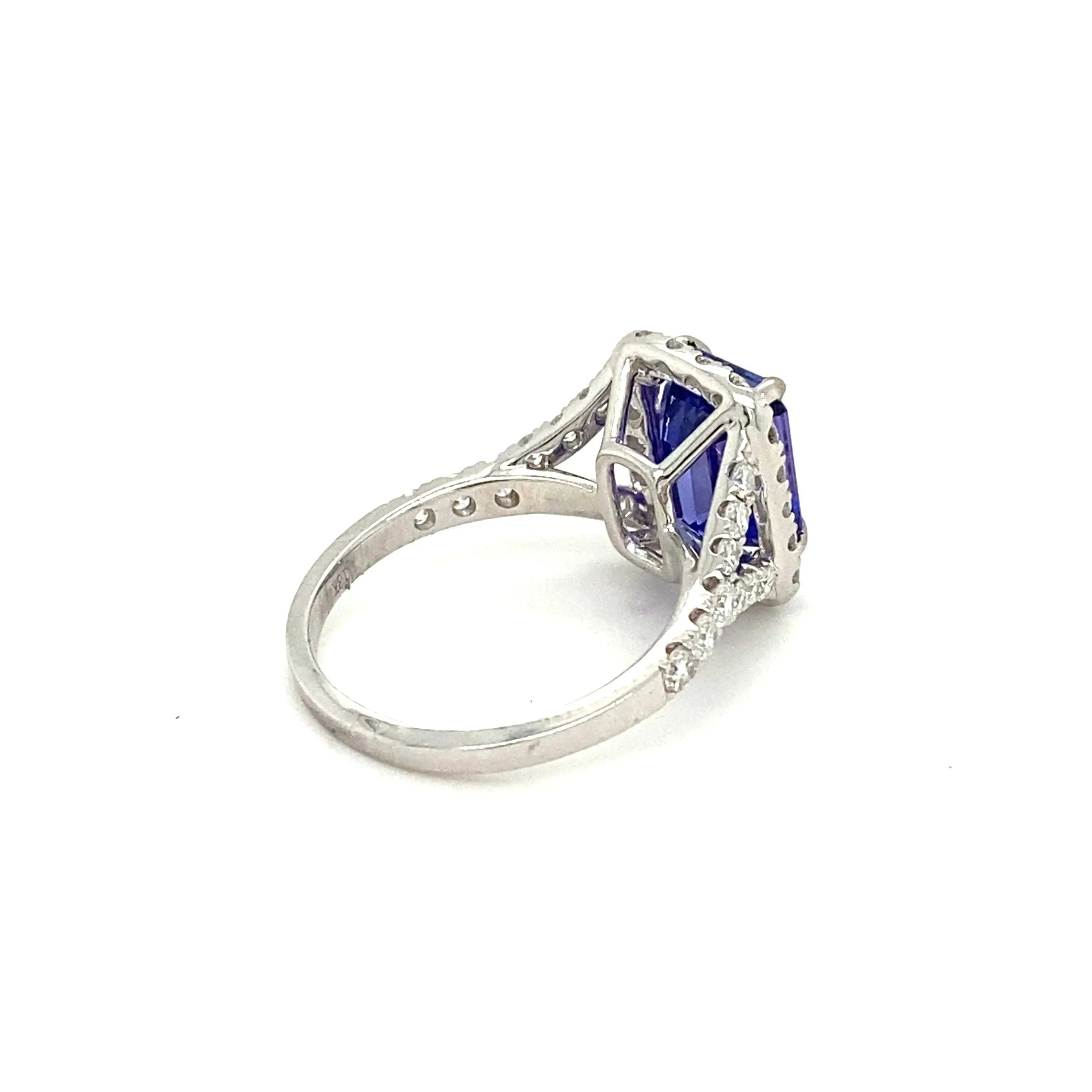 Emerald Cut Tanzanite & Diamond Halo Ring