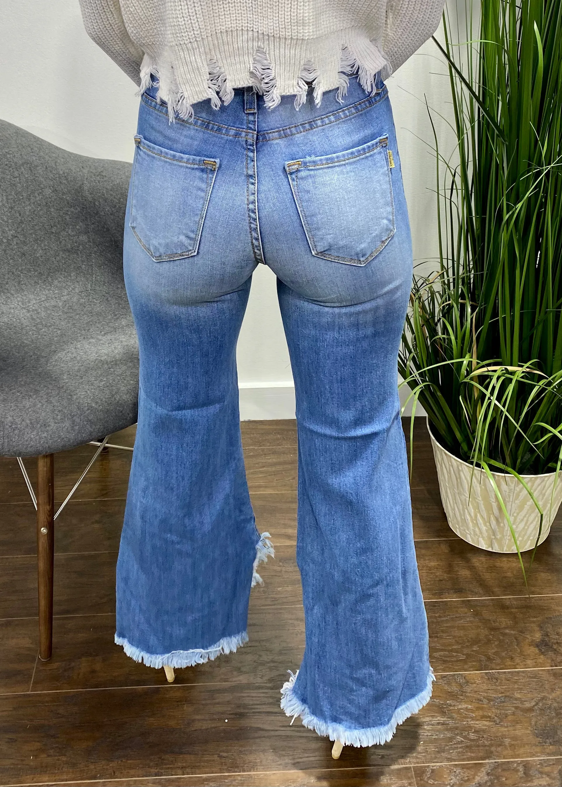 Vibrant Frayed Asymmetrical Flare Jeans (Medium Stone) P1393